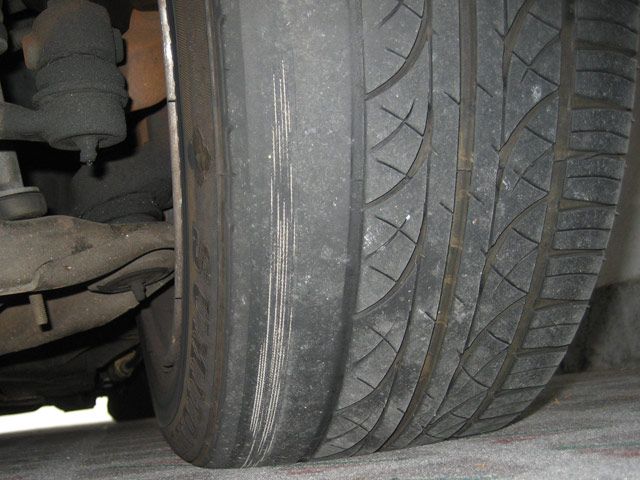 Tyre badly worn by incorrect alignment